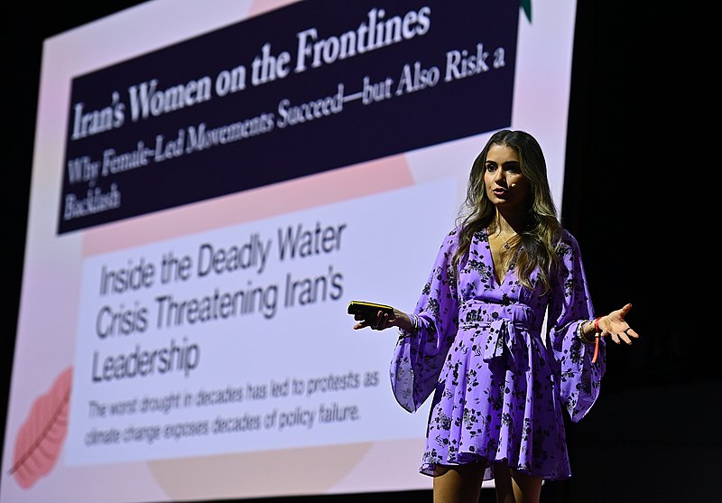 Woman delivering a presentation.