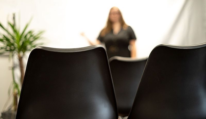 Woman practicing a speech.