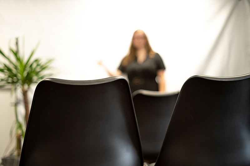 Woman practicing a speech.