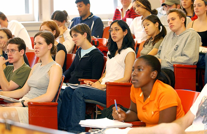 Audience watching a speech.