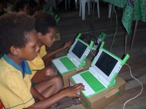 Children using laptop computers.