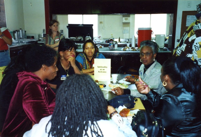 A focus group meets around a table.