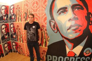 Artist Shepard Fairey with Obama artwork he created